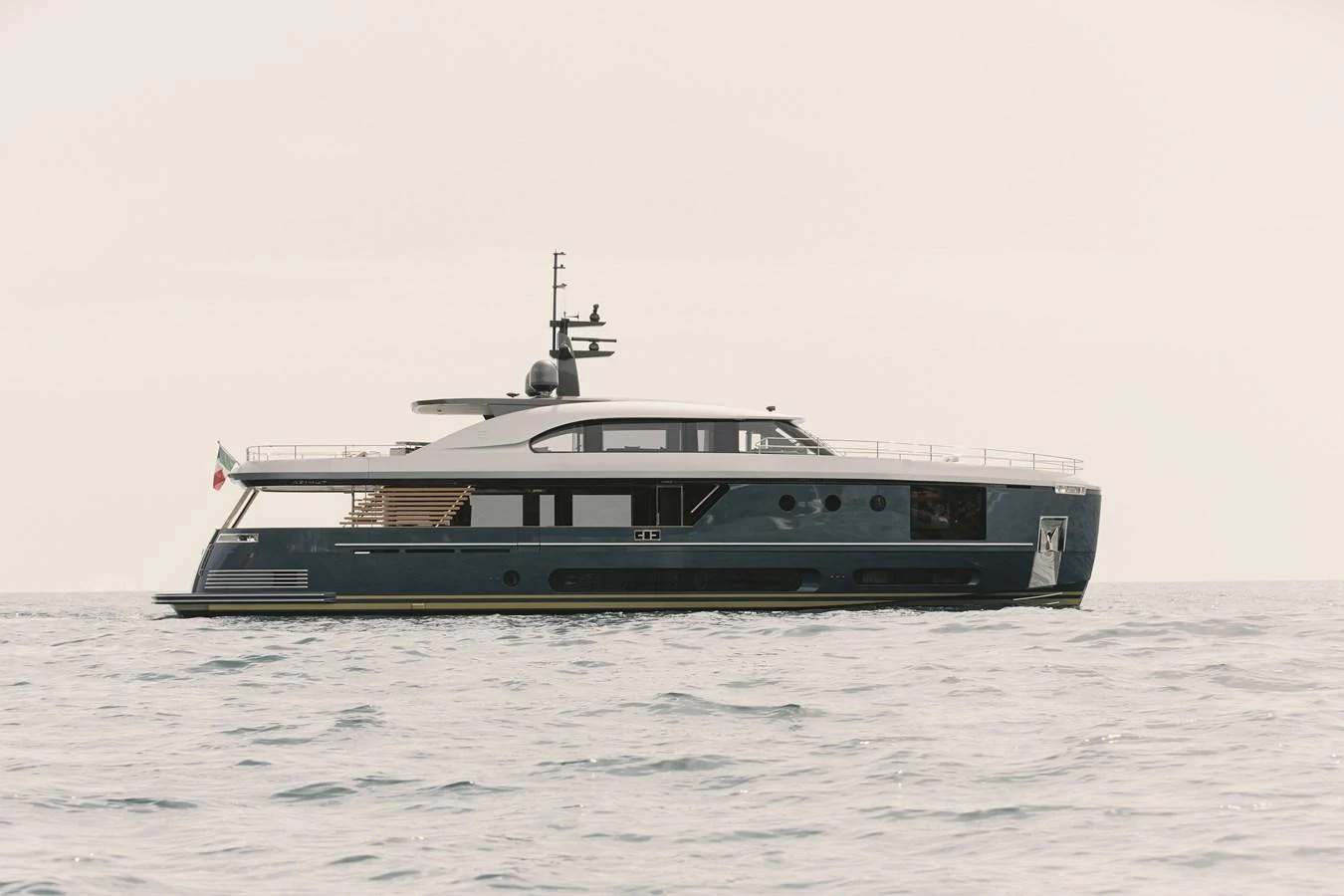 A sleek and modern yacht glides gracefully on calm waters. aboard PALMAX Yacht for Sale
