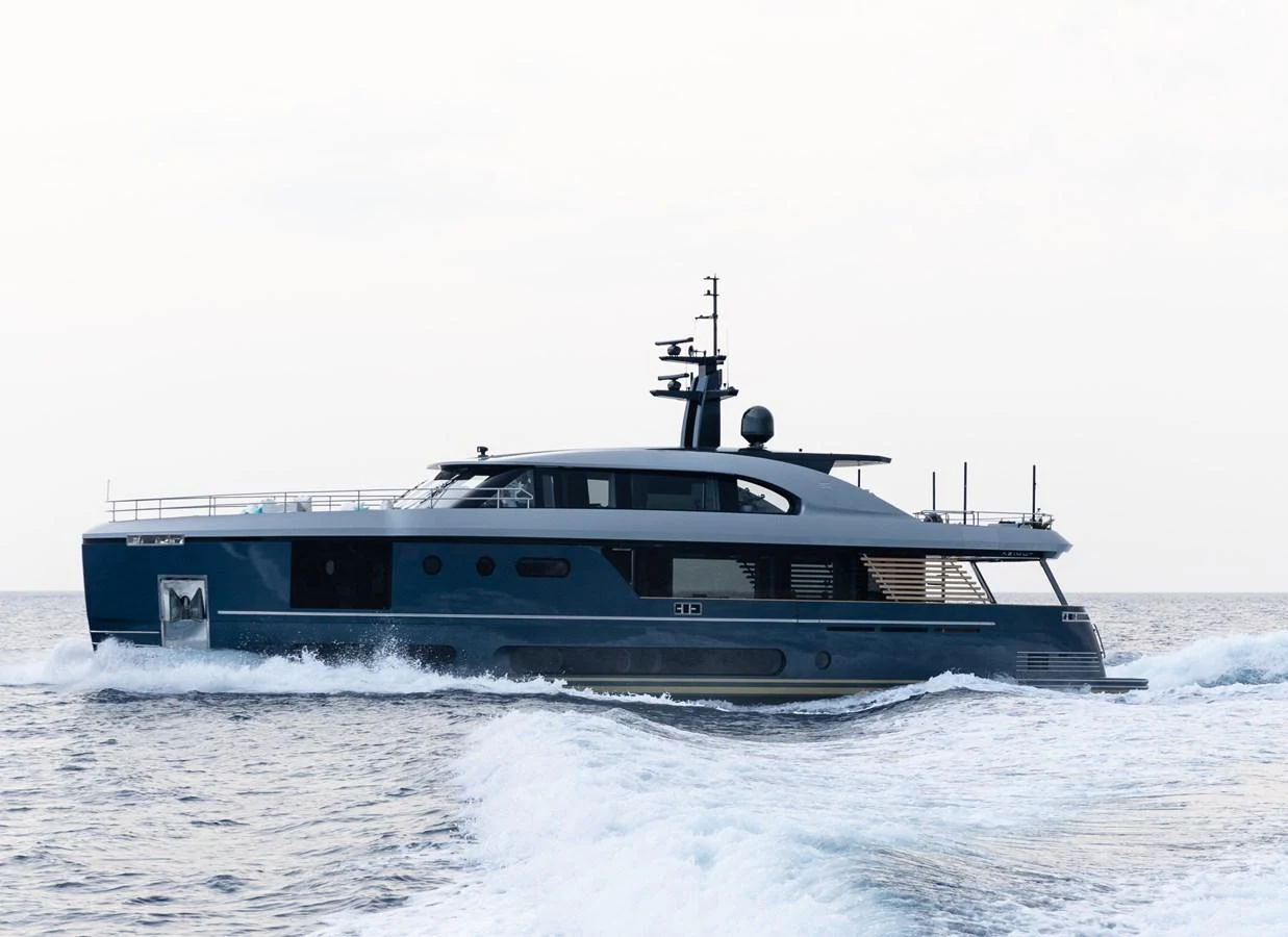 A sleek and modern yacht cruising through open waters. aboard PALMAX Yacht for Sale