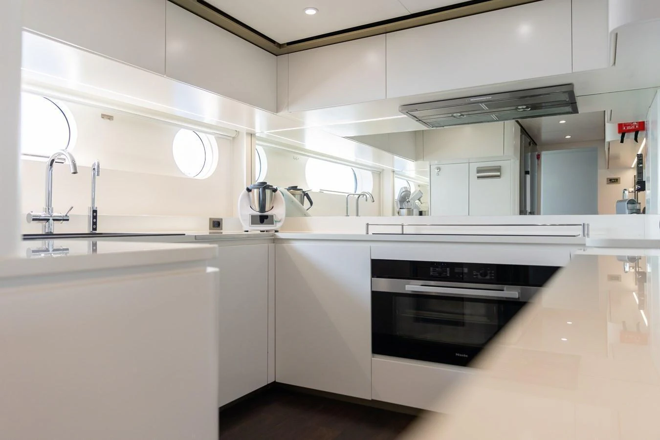 The yacht's galley features sleek, modern appliances and ample counter space for culinary endeavors. aboard PALMAX Yacht for Sale