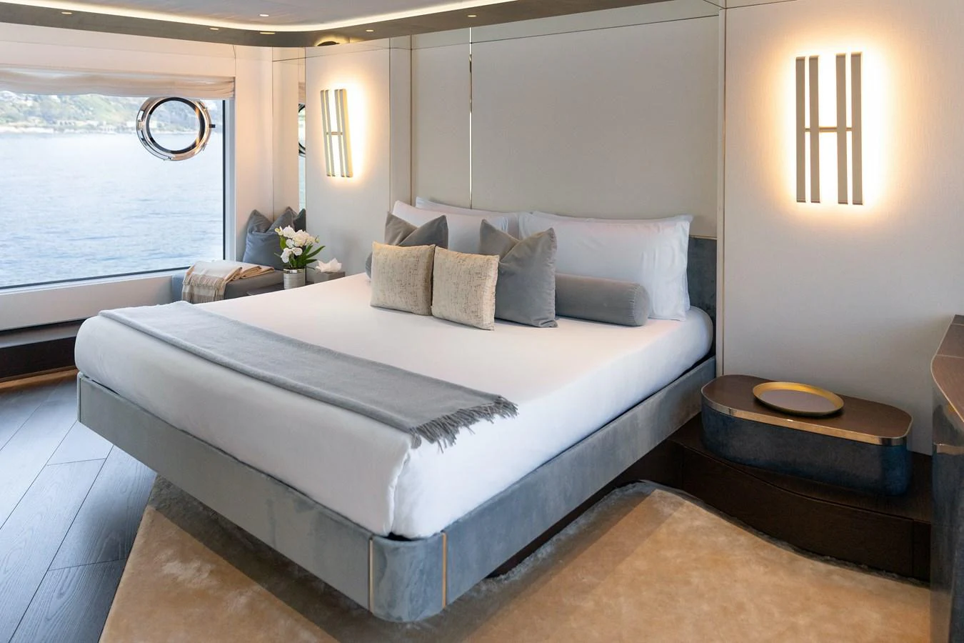 The master stateroom offers a luxurious and serene retreat with a large bed and elegant decor. aboard PALMAX Yacht for Sale