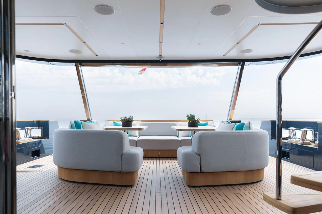 The aft deck features elegant seating with a panoramic view of the sea. aboard PALMAX Yacht for Sale