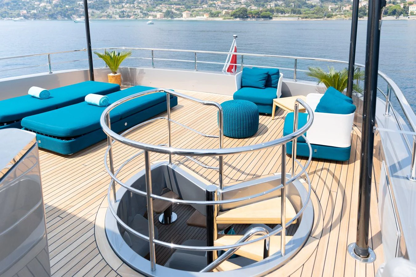 The sundeck offers a relaxing space with comfortable seating and stunning views of the water. aboard PALMAX Yacht for Sale