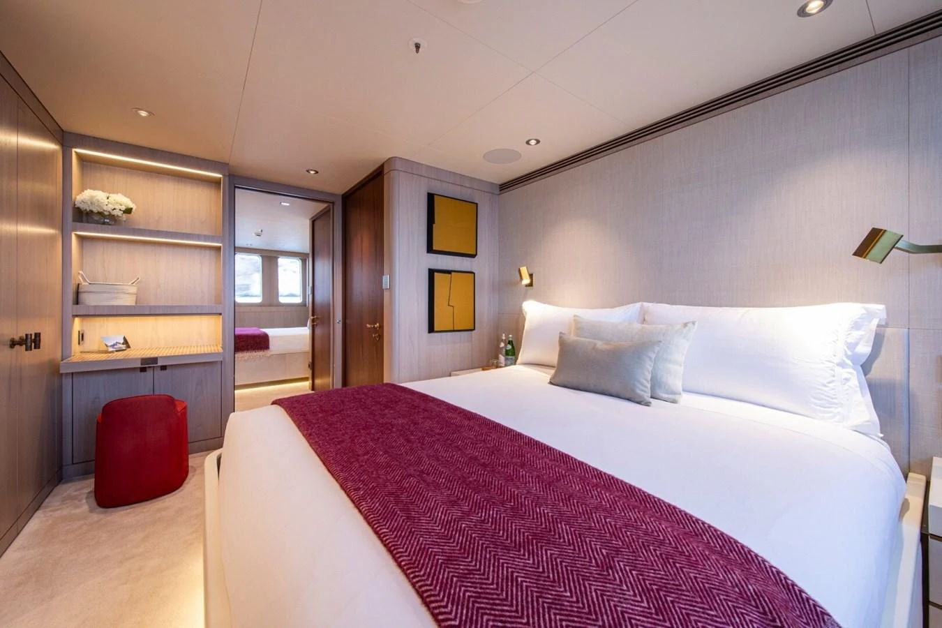 The stateroom features a plush bed with luxurious linens and modern decor. aboard PROMISE Yacht for Sale