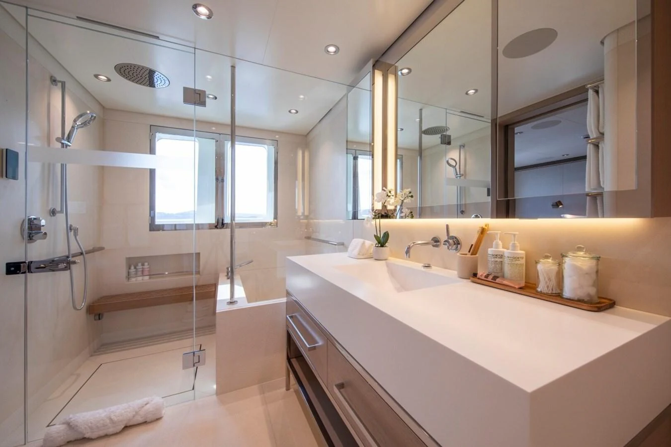 The yacht's bathroom features modern fixtures and a spacious, elegant design. aboard PROMISE Yacht for Sale