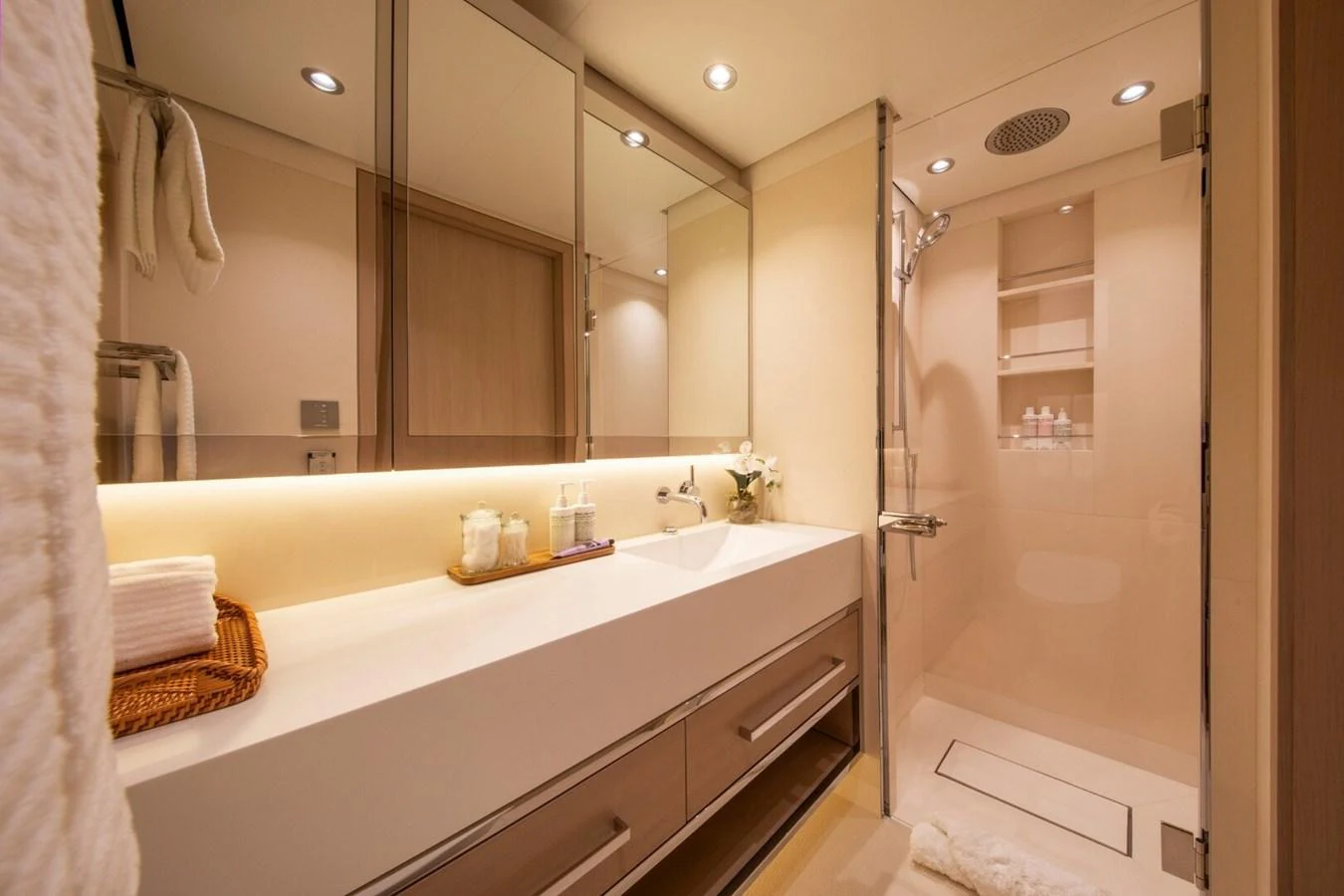 The yacht's bathroom features modern fixtures and a spacious shower area. aboard PROMISE Yacht for Sale