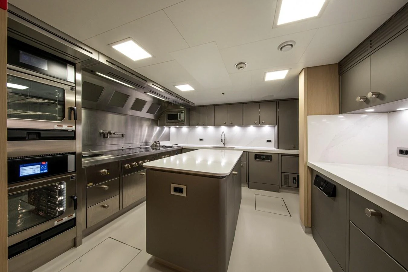 The yacht's galley is equipped with modern appliances and ample counter space for gourmet meal preparation. aboard PROMISE Yacht for Sale