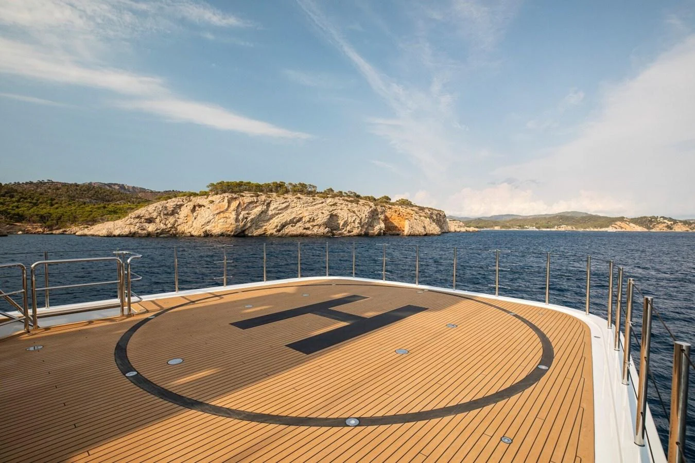 The yacht features a spacious helipad on the deck, offering convenience for aerial arrivals. aboard PROMISE Yacht for Sale
