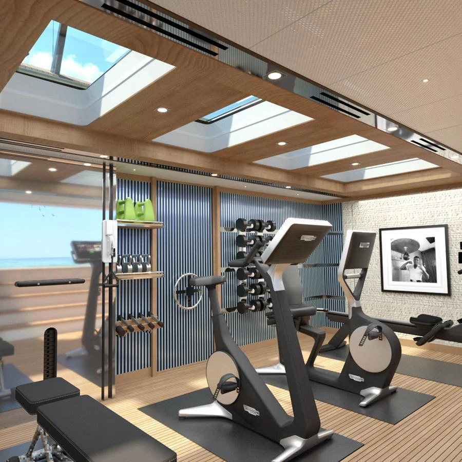 The yacht's gym is equipped with modern fitness machines and offers a bright, airy space for workouts. aboard SPITFIRE Yacht for Sale