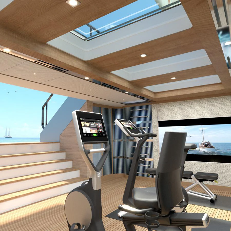 The yacht's gym features modern exercise equipment and a skylight for natural illumination. aboard SPITFIRE Yacht for Sale