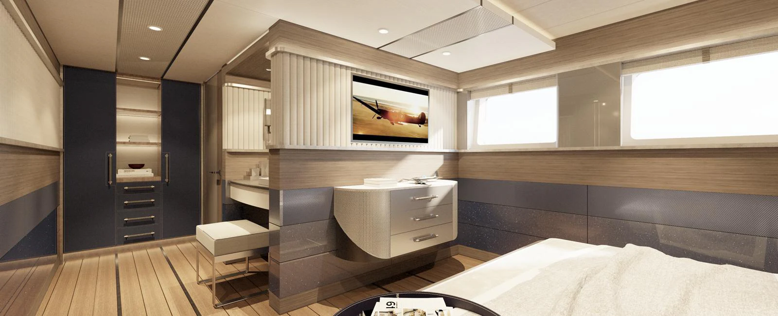 The stateroom features a modern design with sleek furnishings and ample natural light. aboard SPITFIRE Yacht for Sale