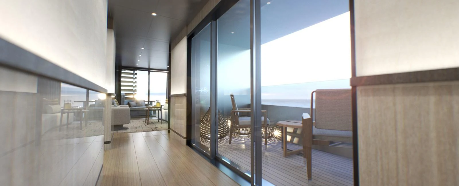 A sleek hallway with large glass doors opens to a cozy outdoor seating area. aboard SPITFIRE Yacht for Sale