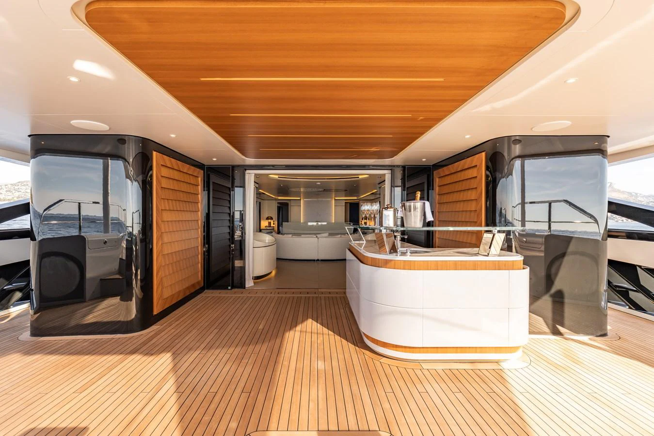 a large room with a wood floor and a large white rectangular object aboard FELICITA Yacht for Sale