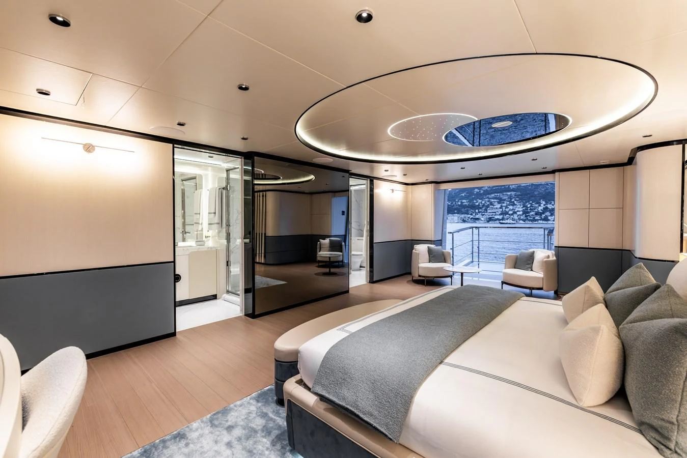 a modern looking living room with a large round ceiling aboard FELICITA Yacht for Sale