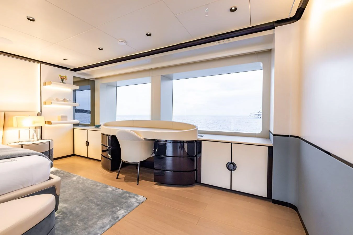 a room with a table and a window aboard FELICITA Yacht for Sale