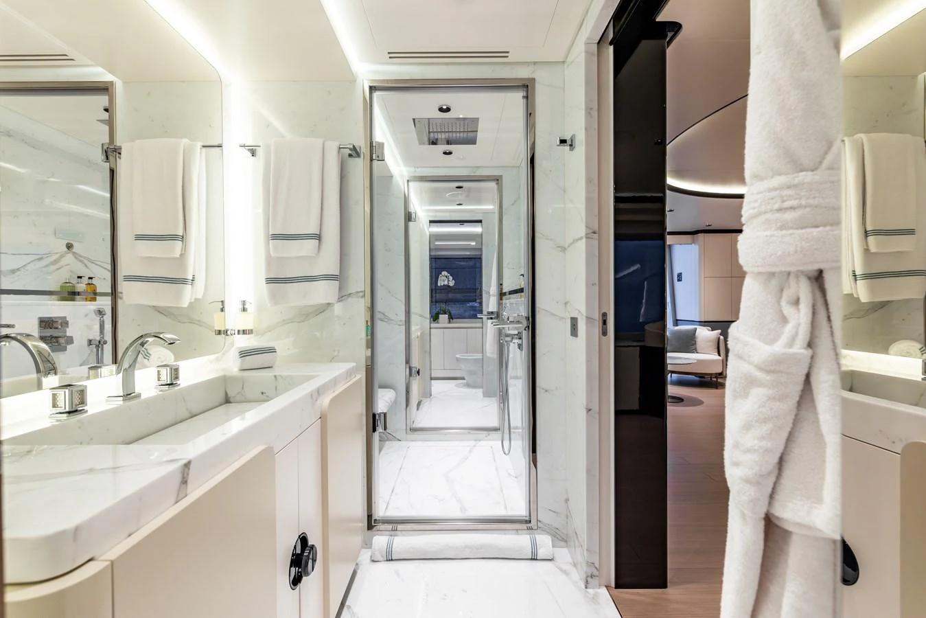 a person in a white robe in a bathroom aboard FELICITA Yacht for Sale