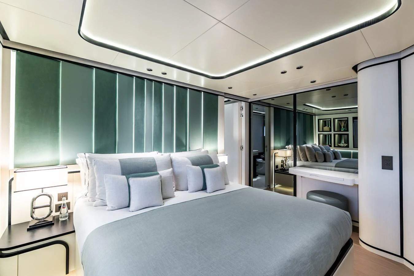 a room with a bed and a large window aboard FELICITA Yacht for Sale