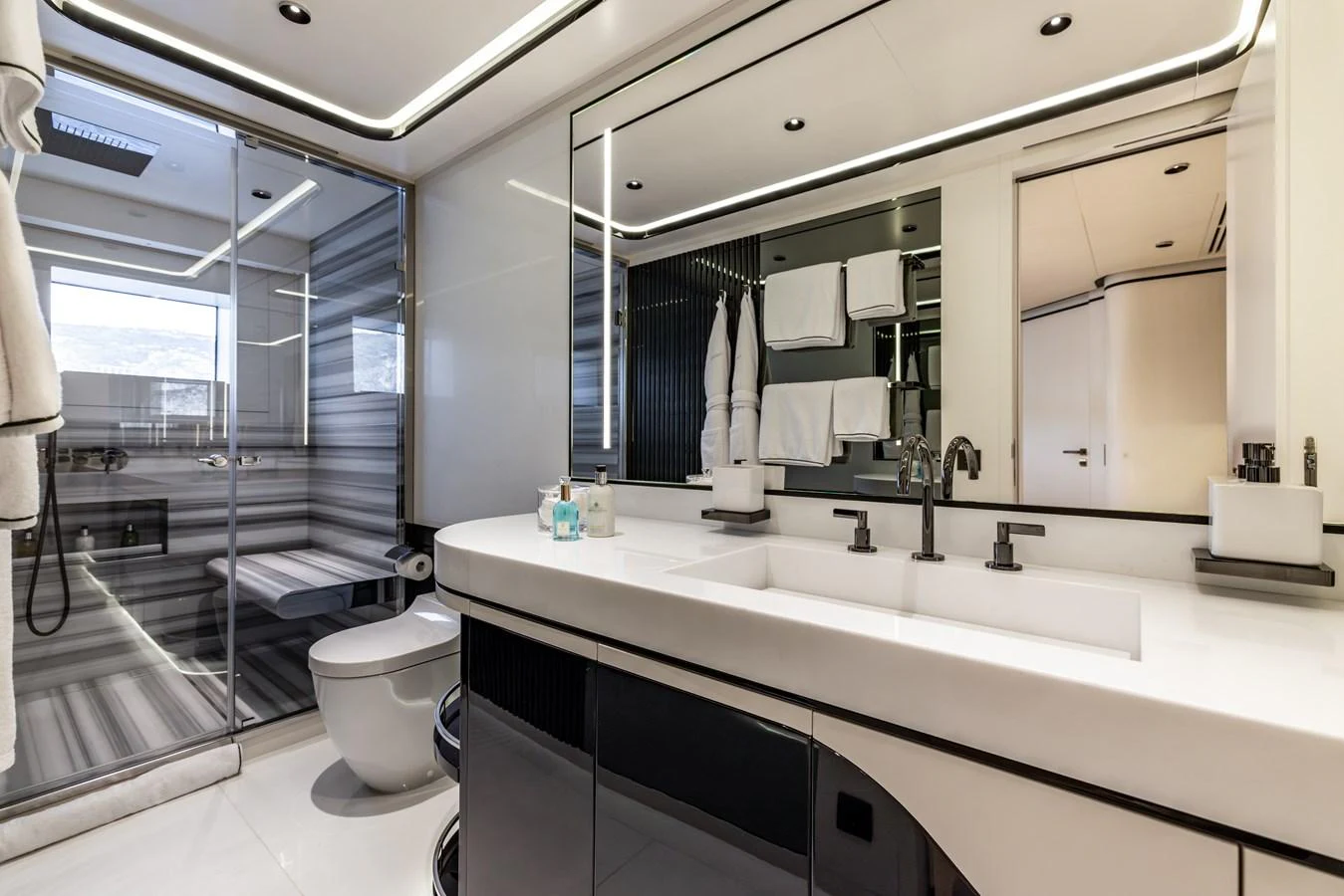 a bathroom with a large mirror aboard FELICITA Yacht for Sale