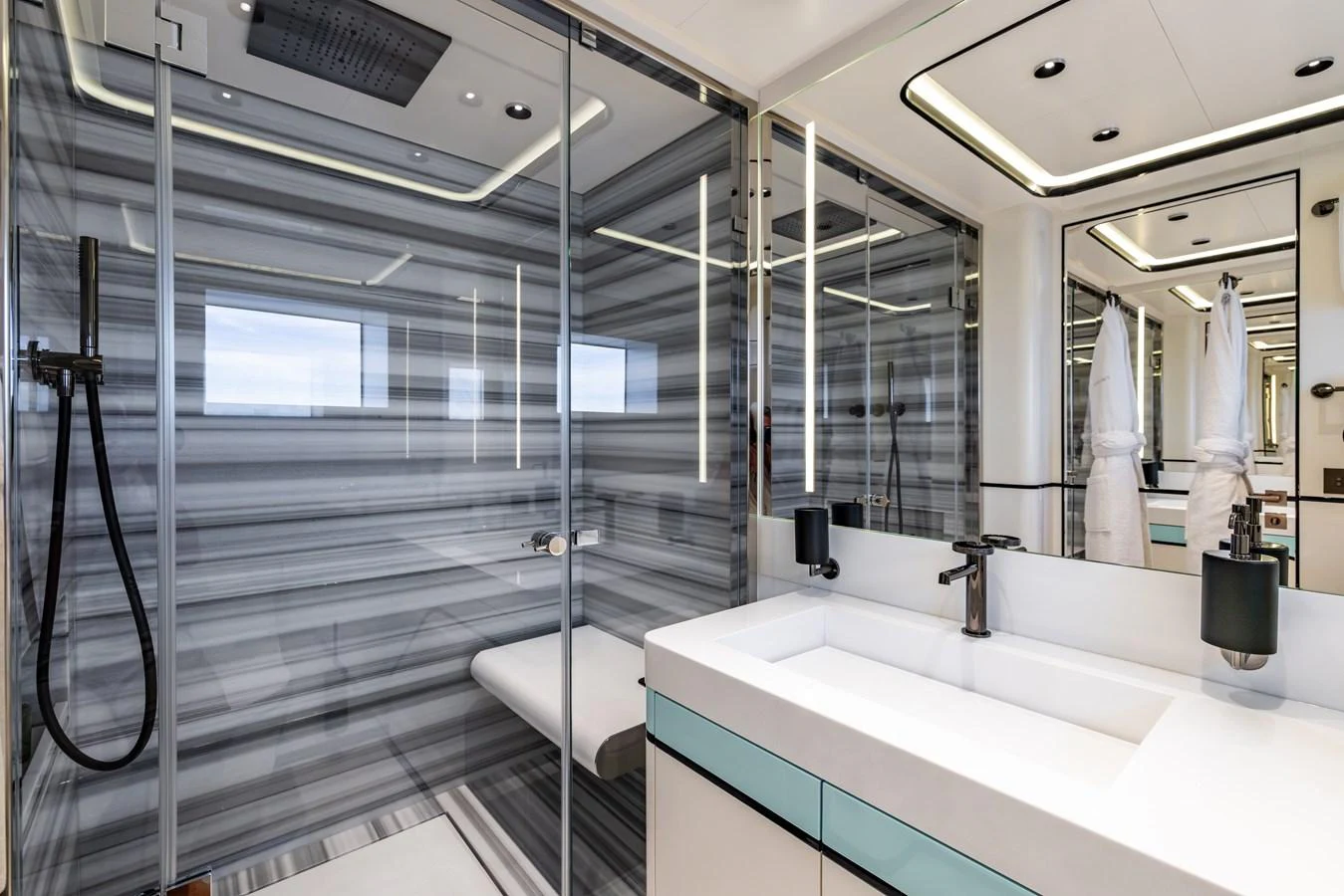 a bathroom with a glass shower aboard FELICITA Yacht for Sale