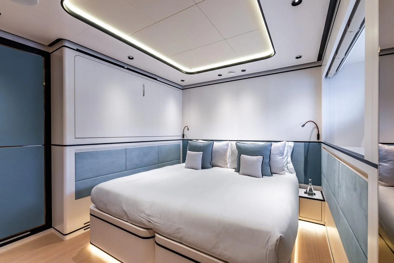 a bedroom with a bed aboard FELICITA Yacht for Sale