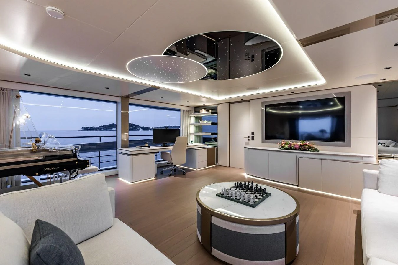 a modern looking living room with a large ceiling aboard FELICITA Yacht for Sale