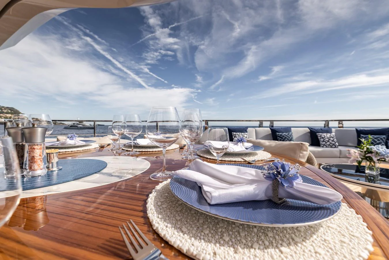 a large room with a large glass table and a large body of water aboard FELICITA Yacht for Sale