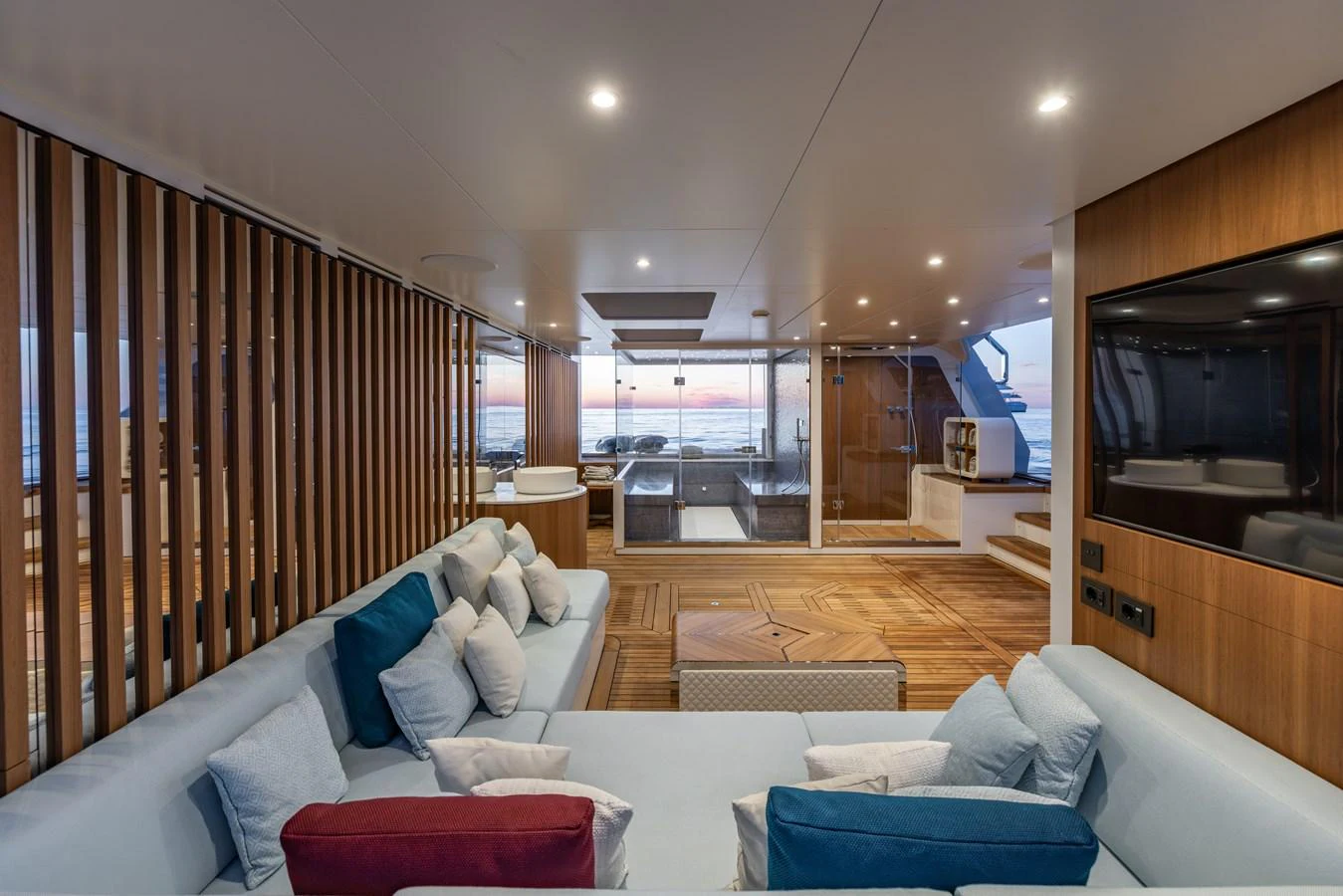 a living room with a large window aboard FELICITA Yacht for Sale