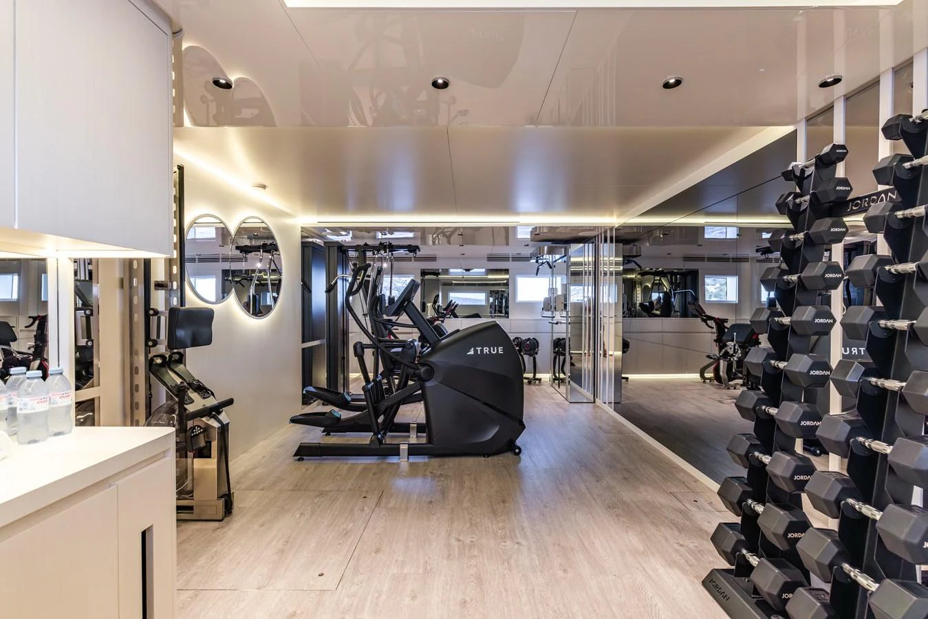 a room with many exercise equipment aboard FELICITA Yacht for Sale