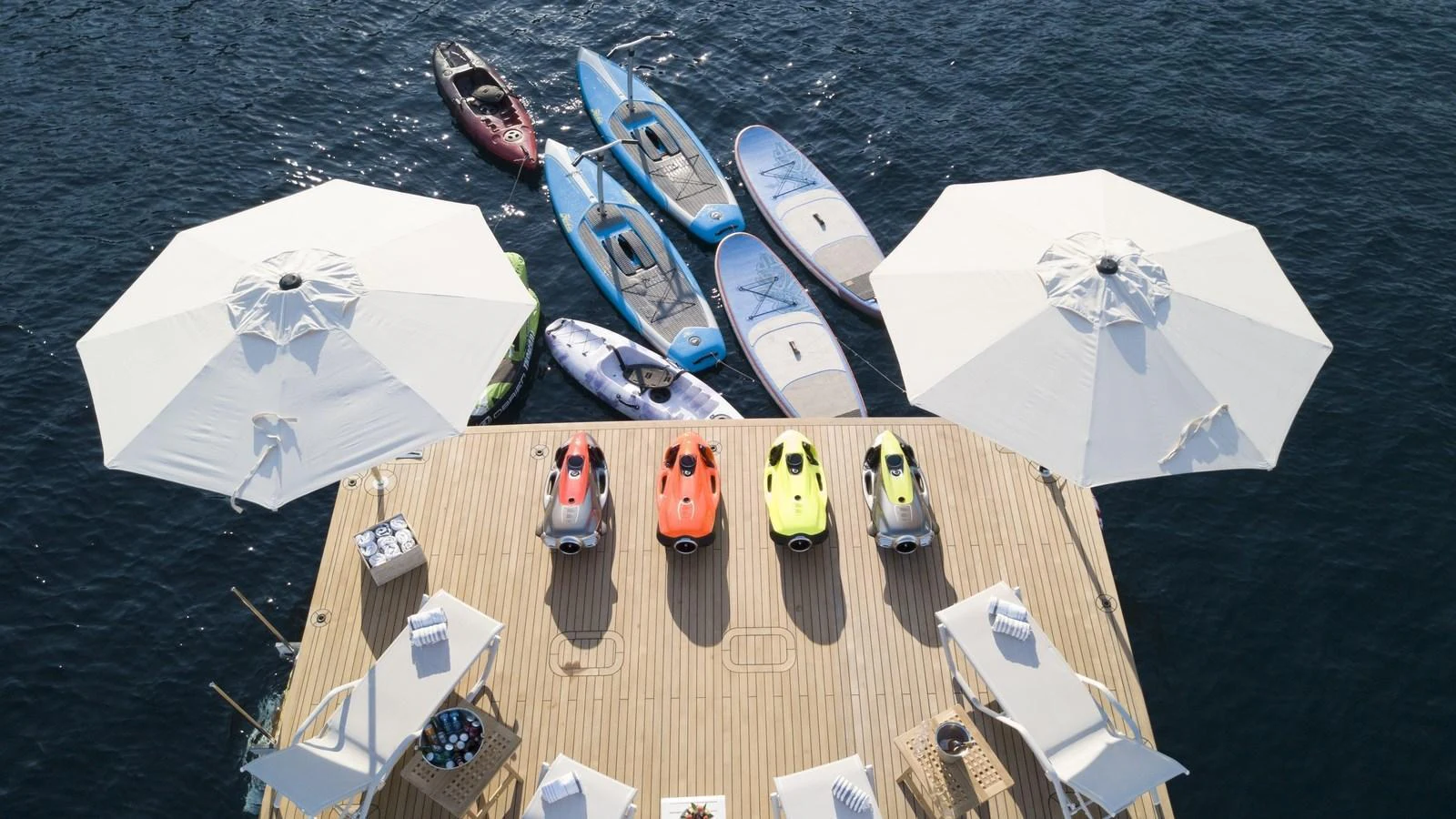 The yacht's water toys deck is equipped with a variety of kayaks, paddleboards, and sea scooters, offering endless fun on the water. aboard ALL ABOUT U Yacht for Sale