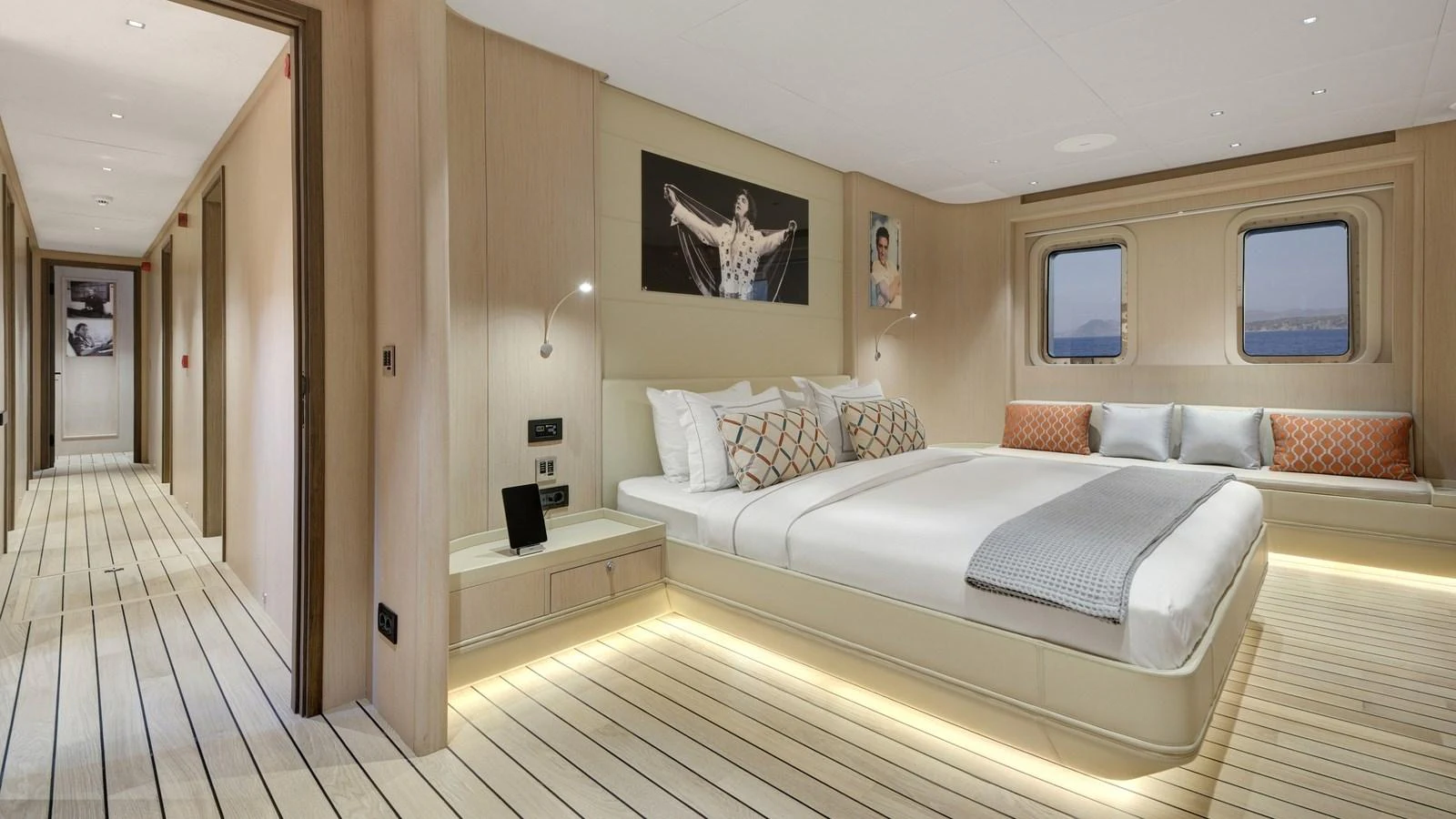 The master stateroom features a spacious bed, elegant decor, and ample natural light from large windows. aboard ALL ABOUT U Yacht for Sale