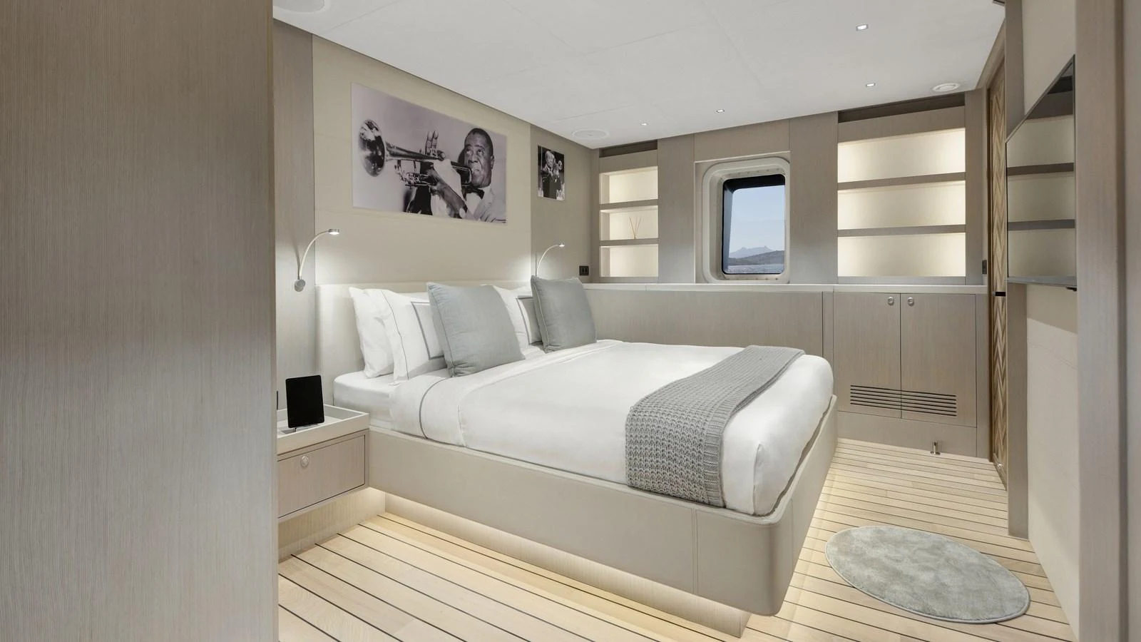 The stateroom features a luxurious double bed with modern decor and ample natural light. aboard ALL ABOUT U Yacht for Sale