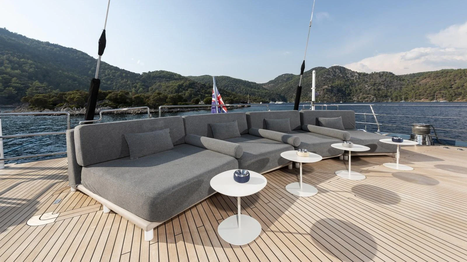 The sundeck features a spacious lounging area with comfortable seating and scenic views. aboard ALL ABOUT U Yacht for Sale