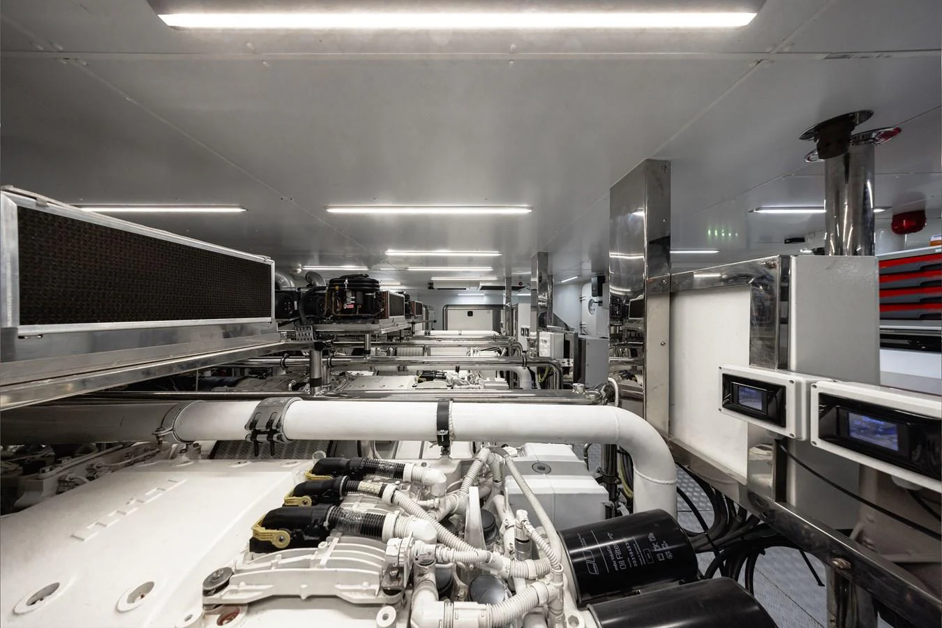 The image showcases the yacht's well-organized and high-tech engine room. aboard FLYING DAGGER III Yacht for Sale