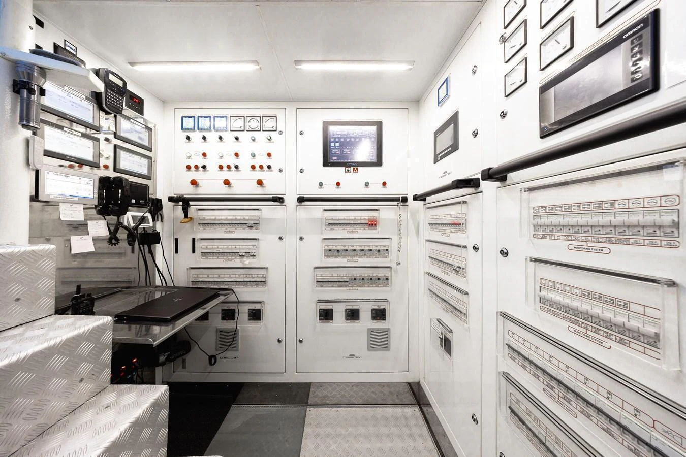 The engine room is equipped with advanced control panels and monitoring systems for optimal yacht operation. aboard FLYING DAGGER III Yacht for Sale