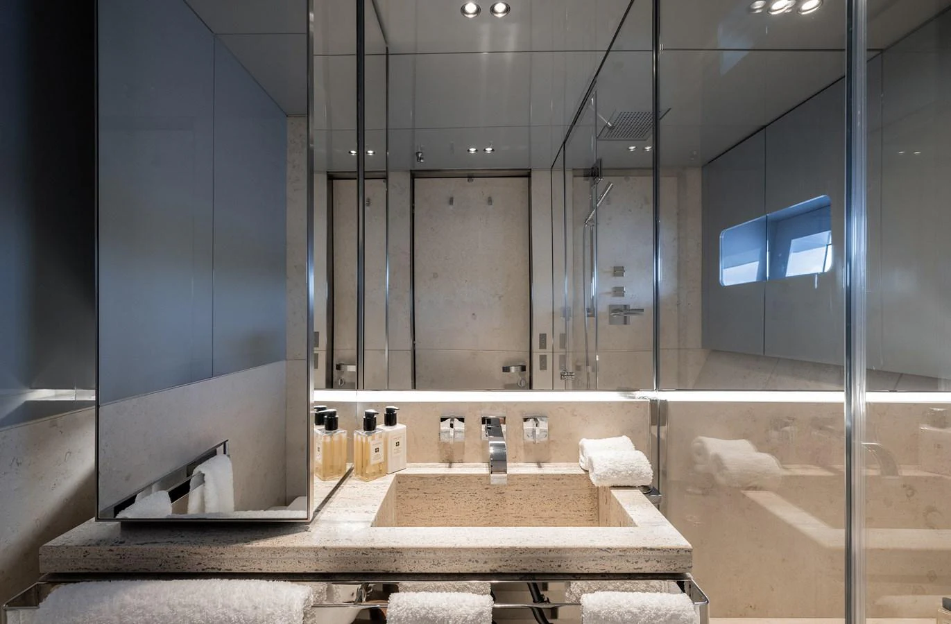 The yacht's bathroom features modern fixtures and a sleek design. aboard FLYING DAGGER III Yacht for Sale