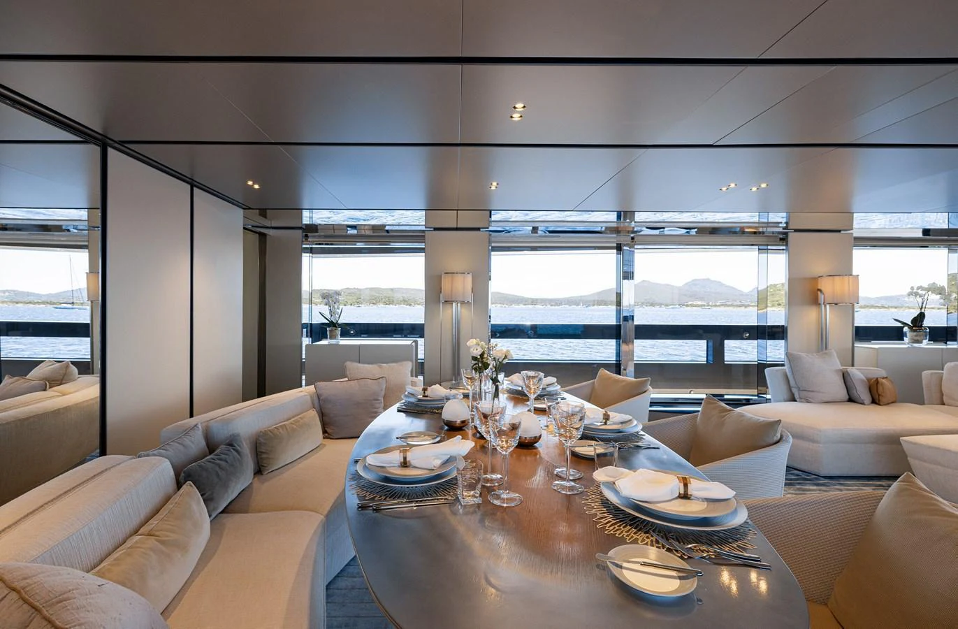 The elegant dining area offers a luxurious setting with panoramic views of the sea. aboard FLYING DAGGER III Yacht for Sale
