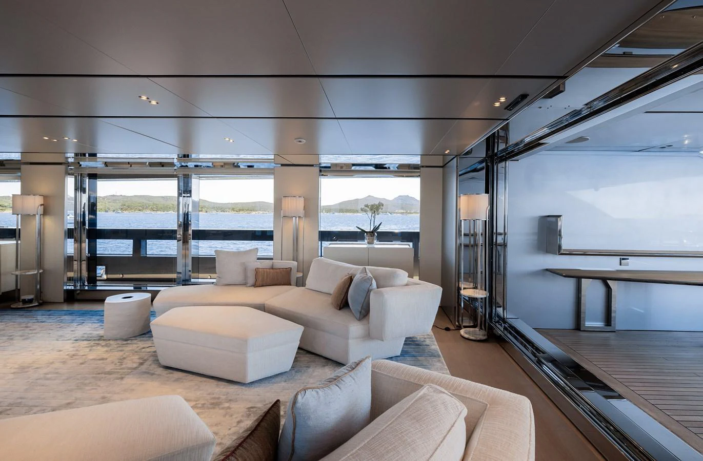 The salon offers a spacious and elegant seating area with panoramic views of the sea. aboard FLYING DAGGER III Yacht for Sale