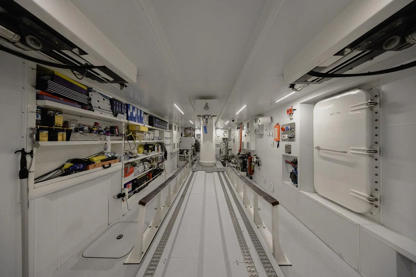 The yacht's engine room is well-organized and equipped with essential tools and machinery. aboard FLYING DAGGER III Yacht for Sale