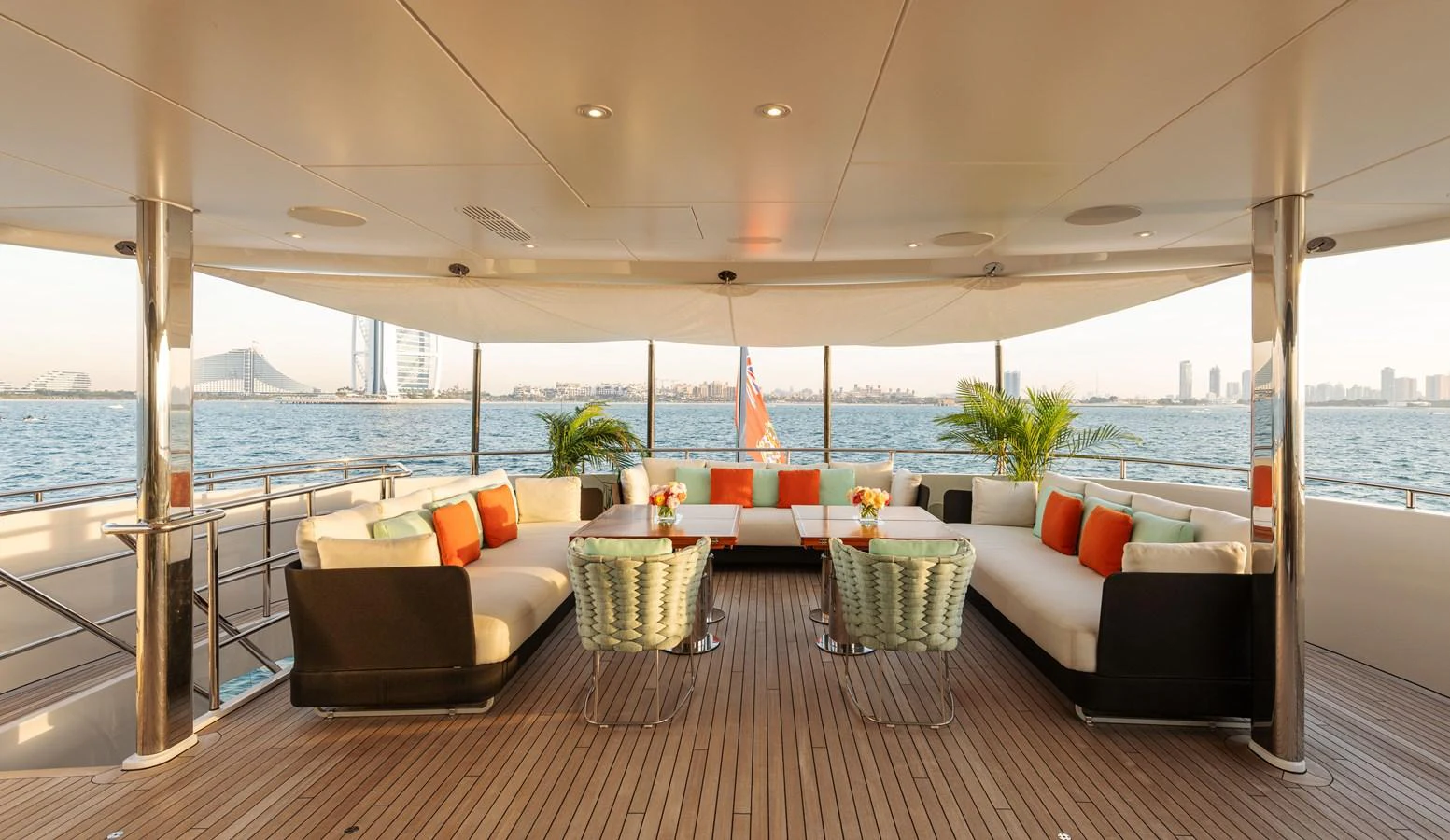 The aft deck offers a spacious and inviting area with comfortable seating and stunning views of the water. aboard ROCKET Yacht for Sale