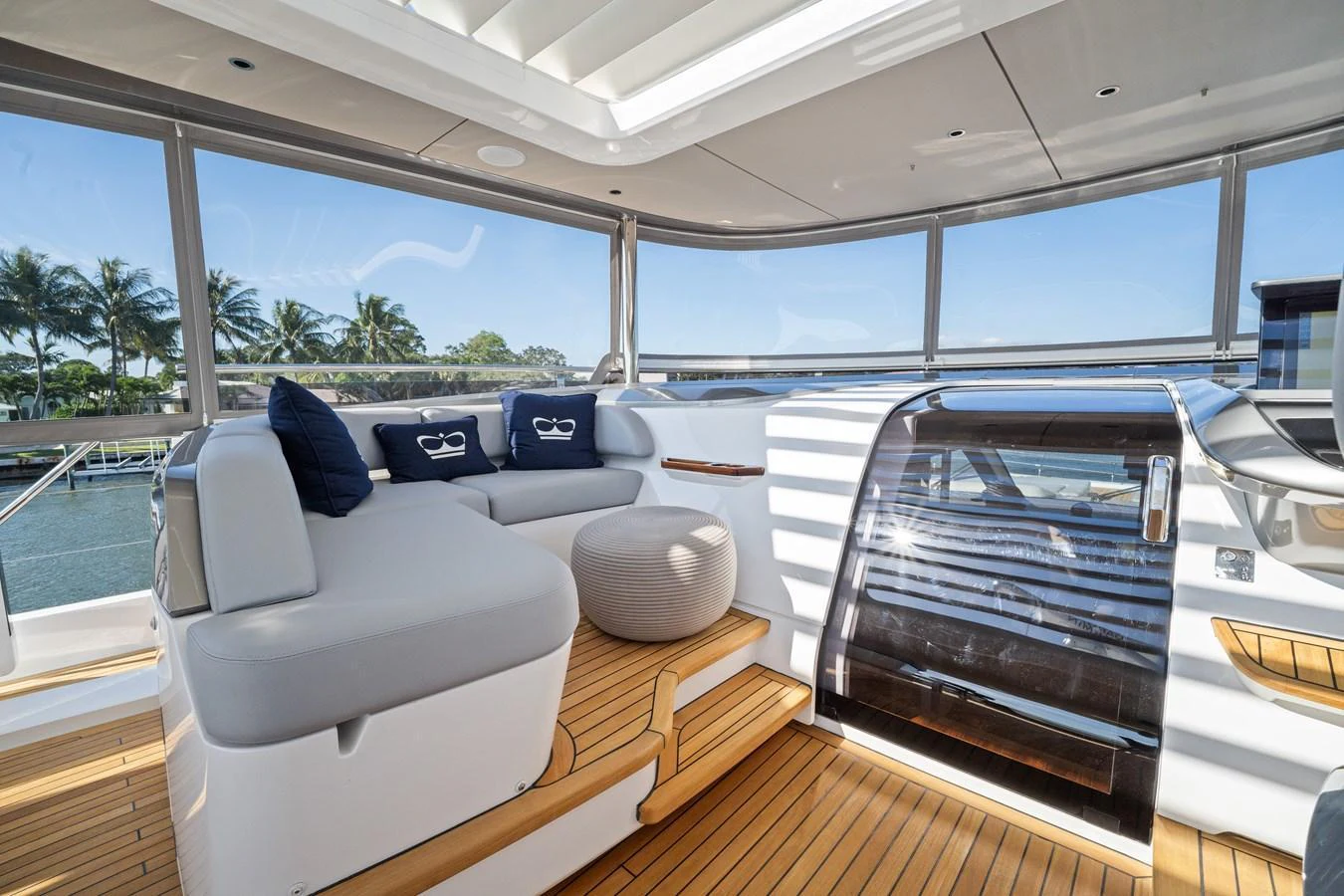 The flybridge offers a luxurious seating area with panoramic views and elegant design. aboard JUST PERFECT Yacht for Sale