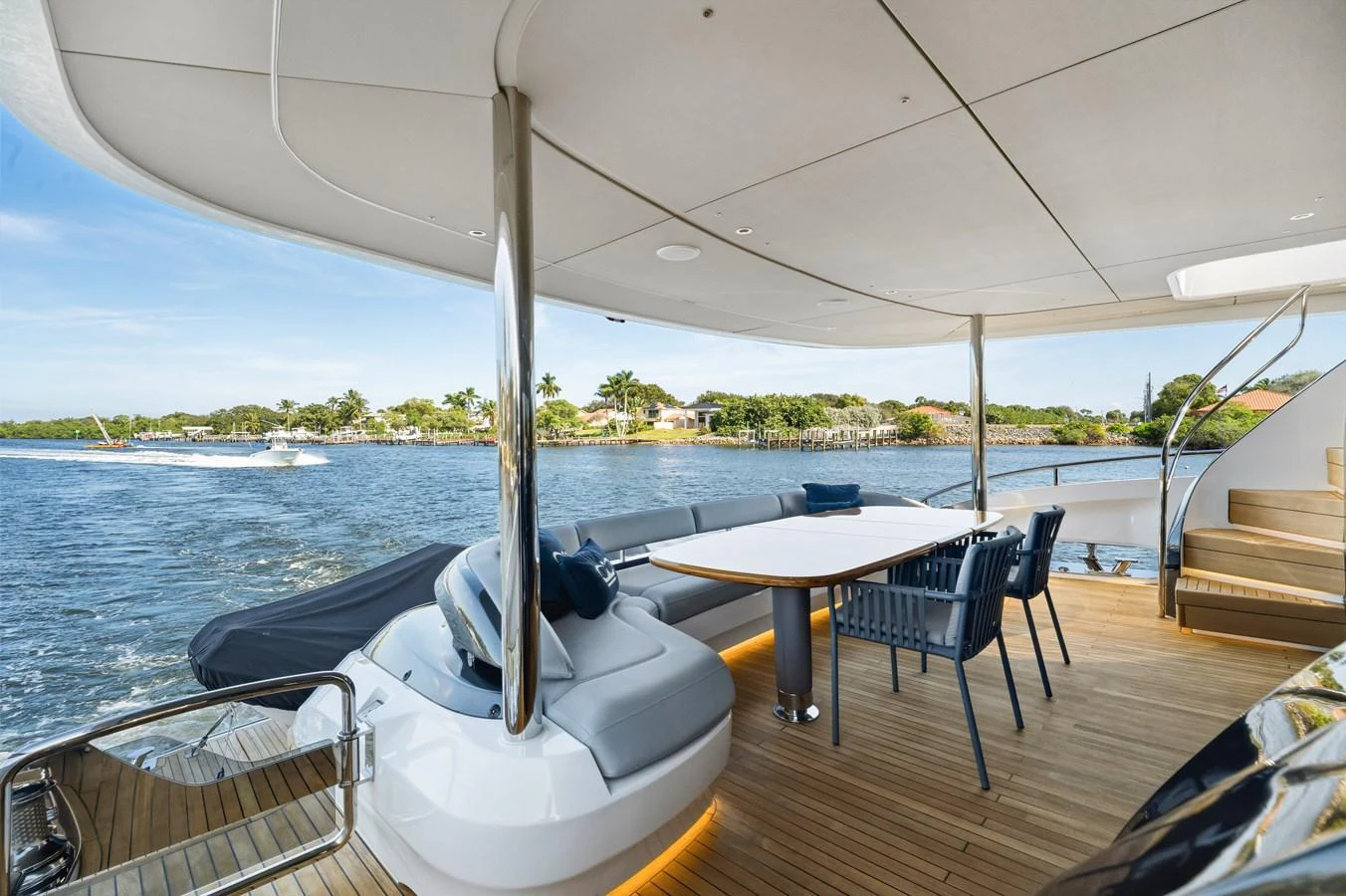 The aft deck offers a spacious and inviting area for alfresco dining with stunning water views. aboard JUST PERFECT Yacht for Sale