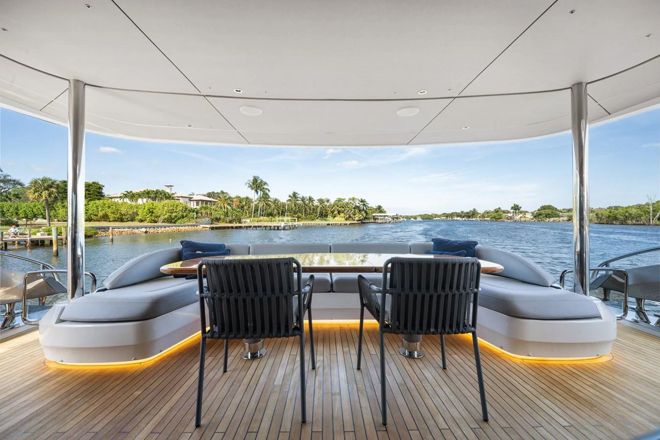 The aft deck offers a serene view over the water, with comfortable seating and a stylish design. aboard JUST PERFECT Yacht for Sale