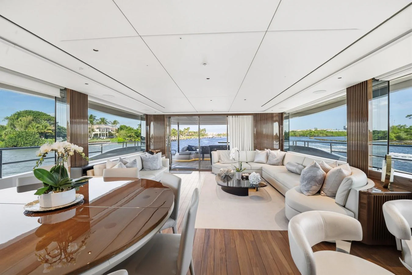 The spacious salon offers panoramic views and luxurious seating arrangements. aboard JUST PERFECT Yacht for Sale