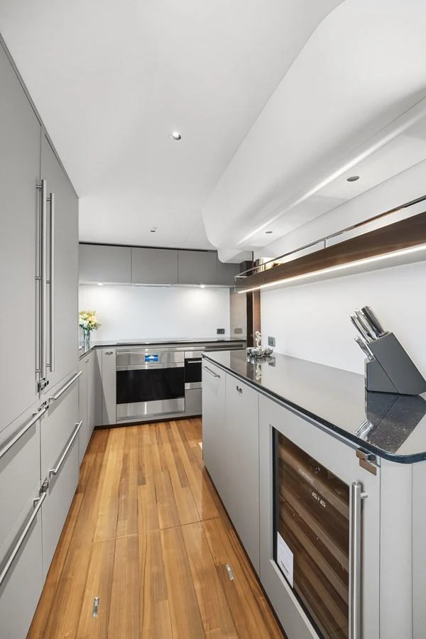 The sleek and modern galley features high-end appliances and ample storage space. aboard JUST PERFECT Yacht for Sale