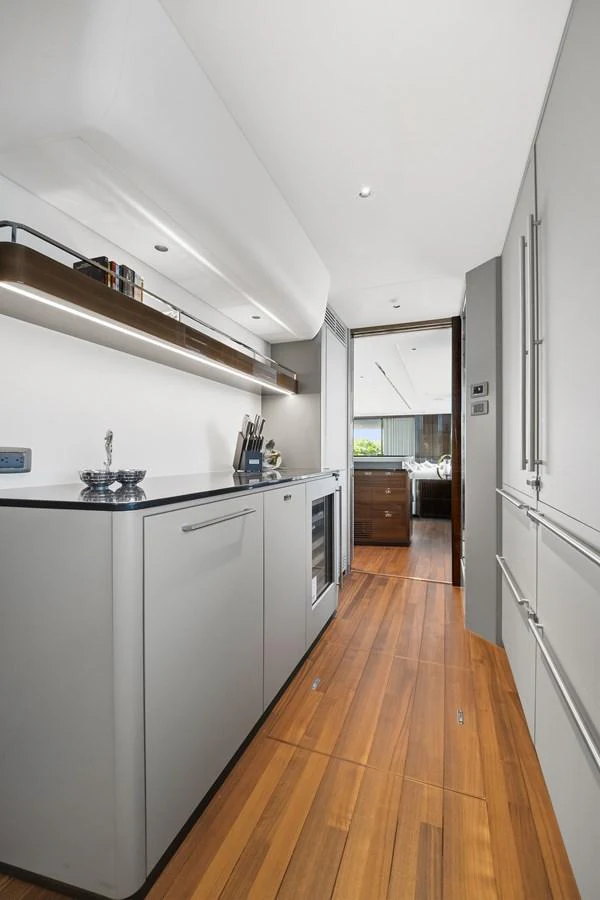 A sleek and modern galley with high-end appliances and stylish finishes. aboard JUST PERFECT Yacht for Sale