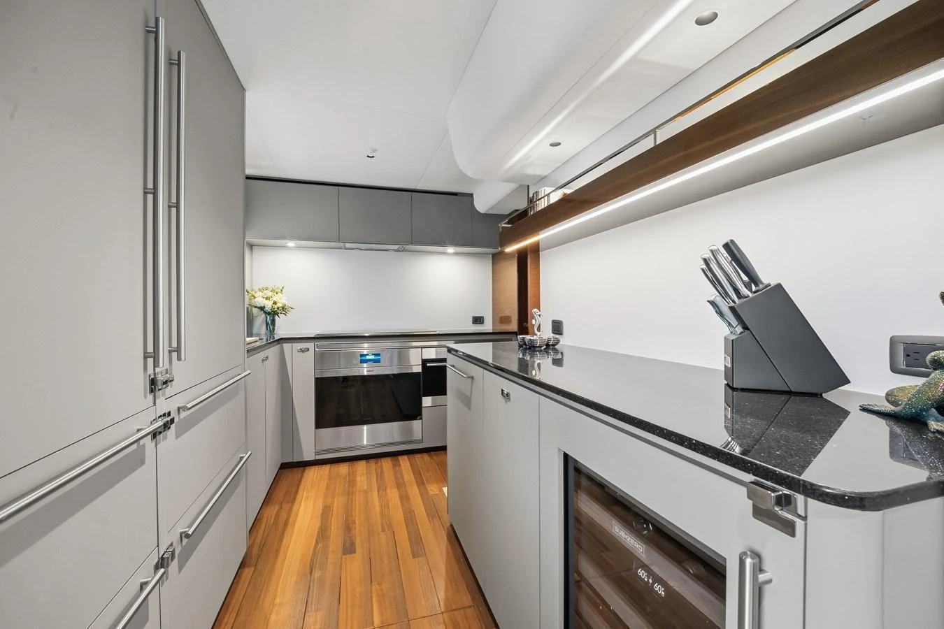 The galley features modern appliances and sleek cabinetry, perfect for gourmet cooking. aboard JUST PERFECT Yacht for Sale