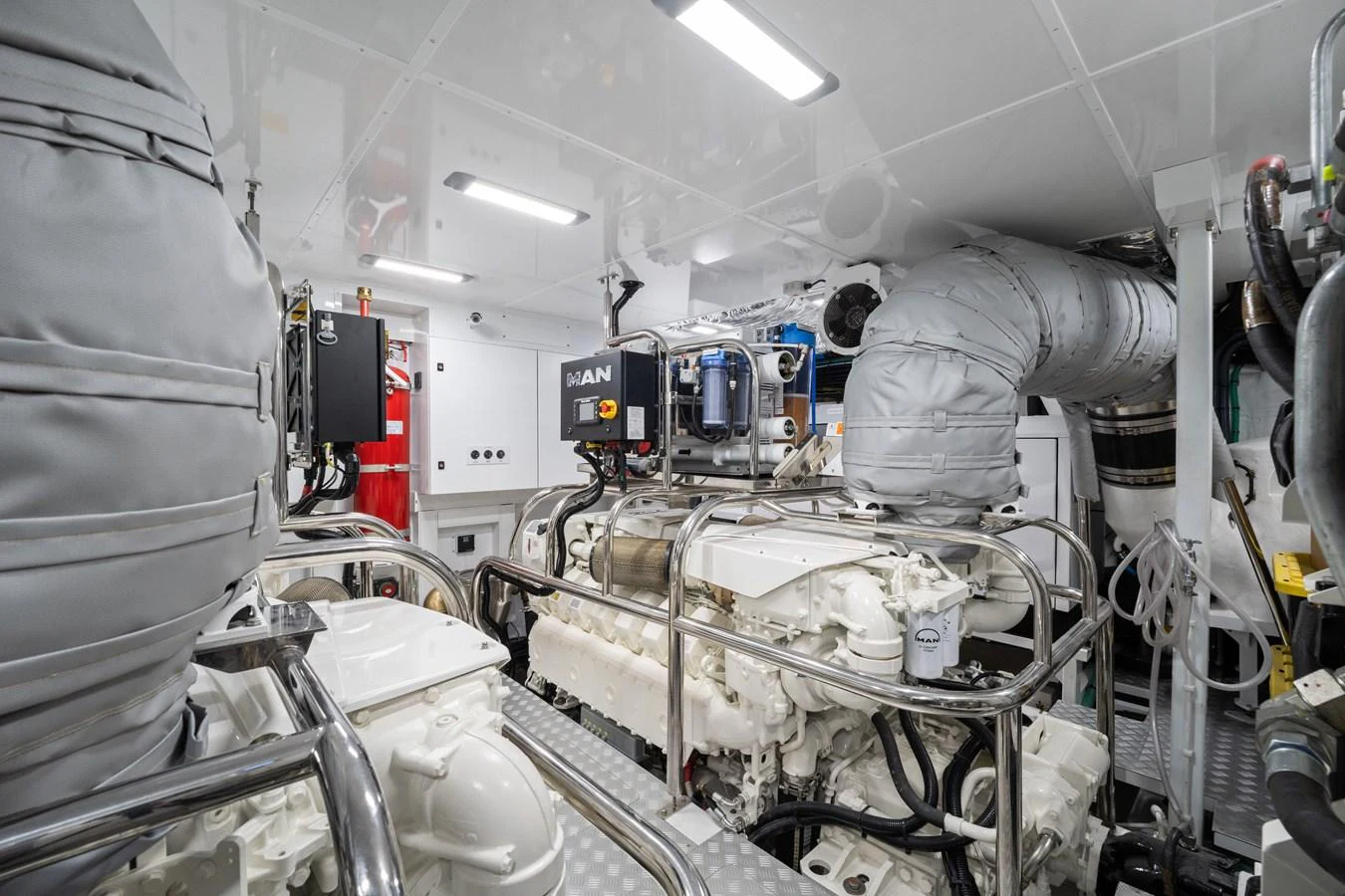 The yacht's engine room is equipped with advanced machinery and well-organized systems. aboard JUST PERFECT Yacht for Sale