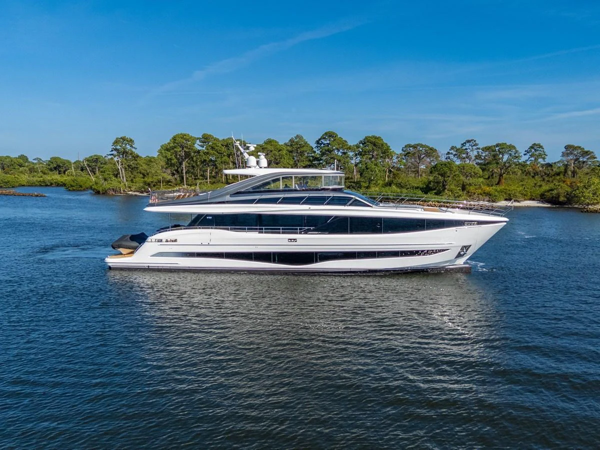 A sleek and modern yacht glides gracefully on calm waters, showcasing its elegant design and spacious decks. aboard JUST PERFECT Yacht for Sale