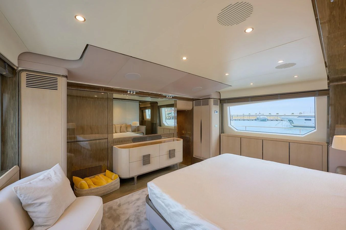 The master stateroom features a spacious layout with modern furnishings and large windows for natural light. aboard SUN & SEA Yacht for Sale