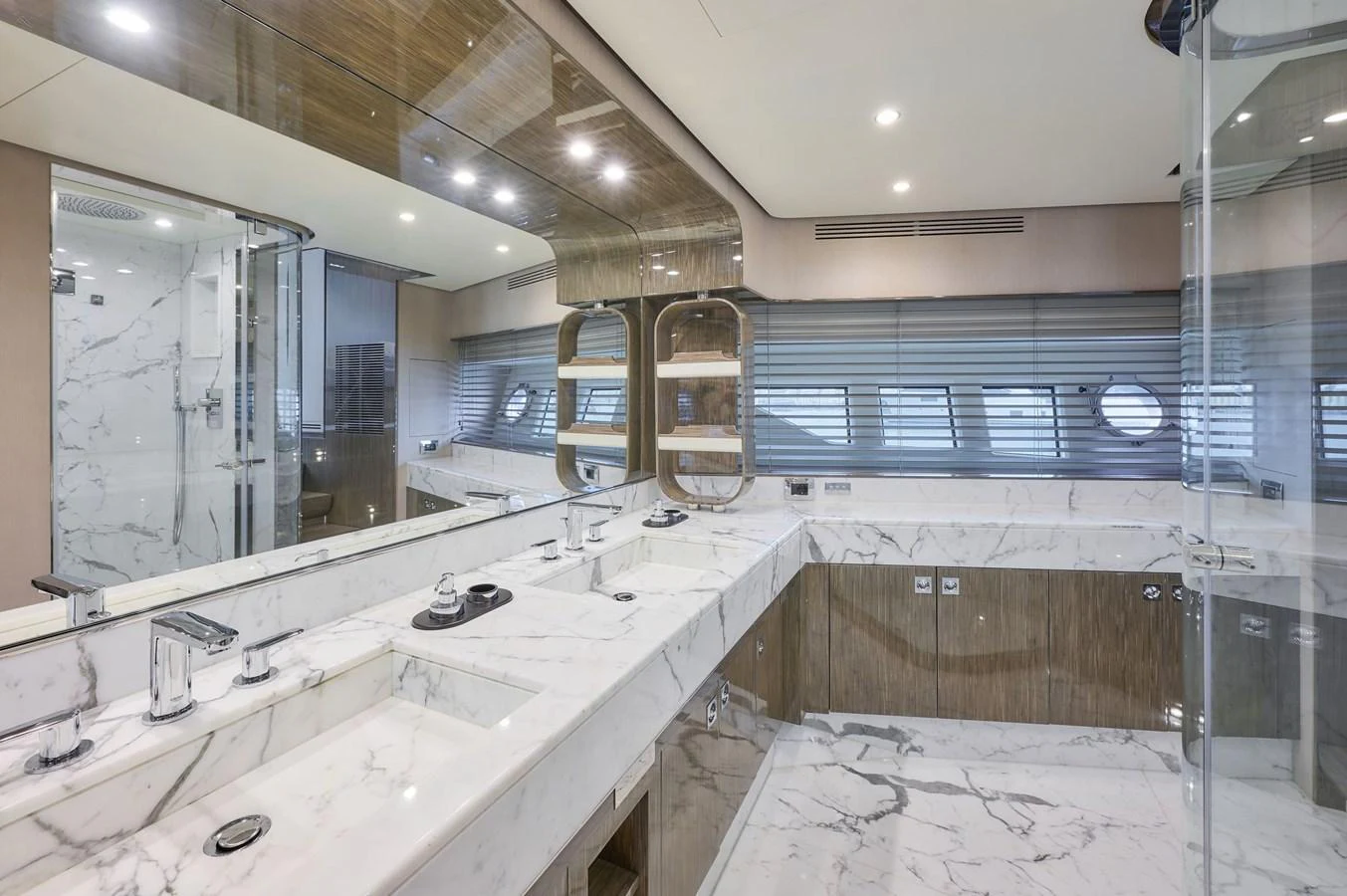 The yacht's bathroom features luxurious marble countertops and modern fixtures. aboard SUN & SEA Yacht for Sale