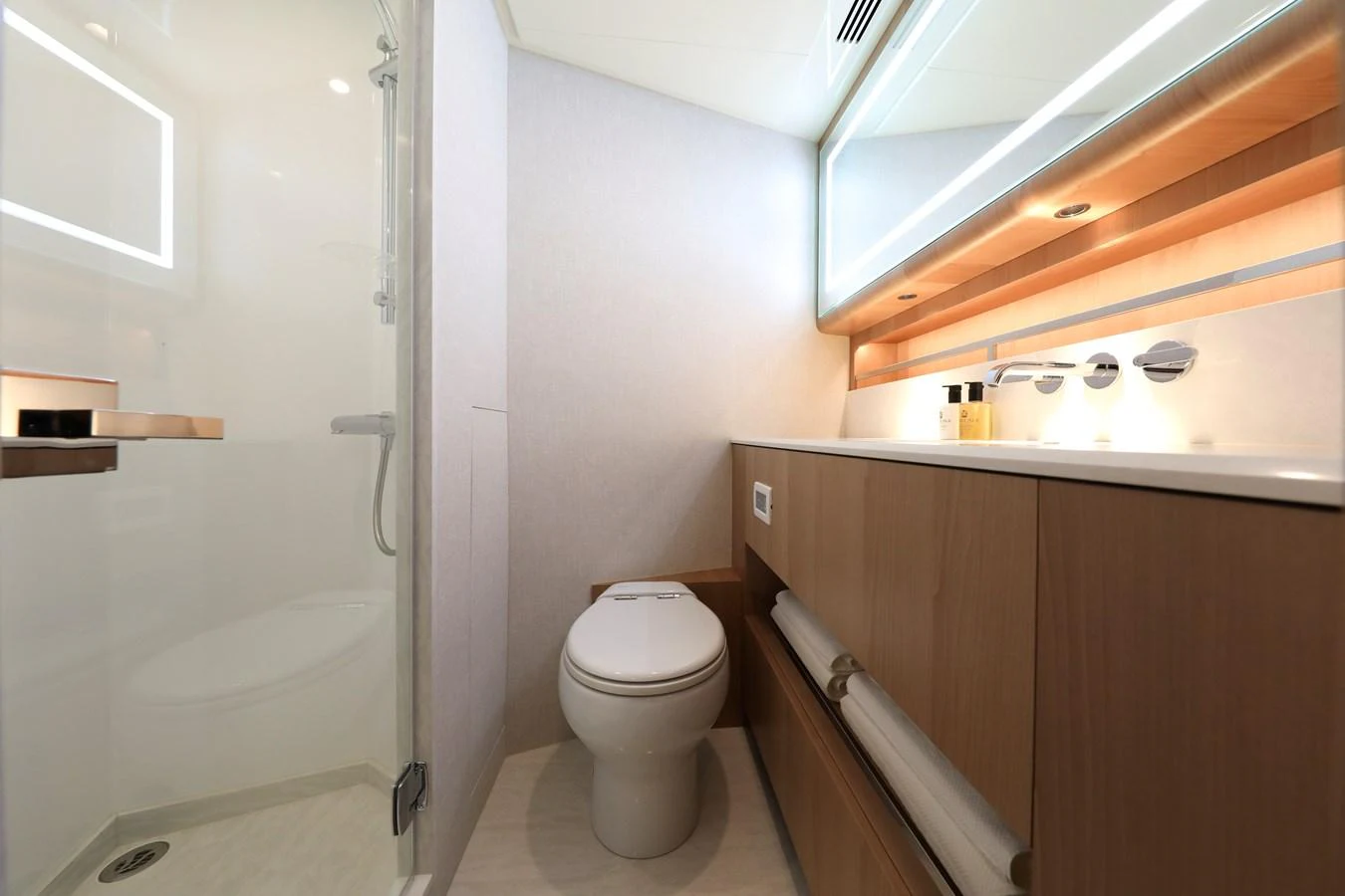 The yacht's bathroom features modern fixtures and a sleek design. aboard OCEAN ALEXANDER 28L Yacht for Sale